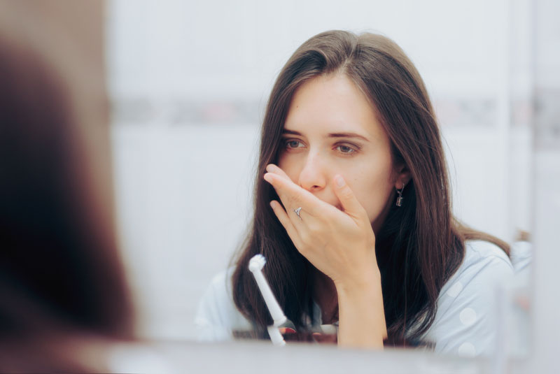 dental patient after noticing issues with gums