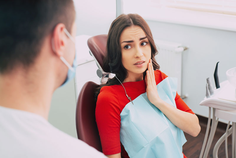 gum recession dental patient experiencing tooth pain